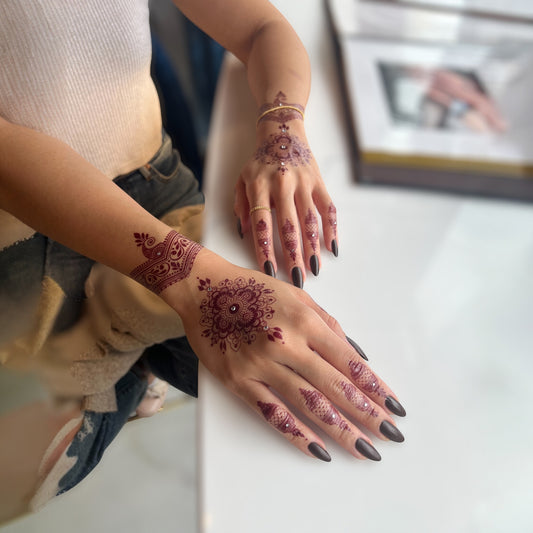 Dewdrop henna body art applied on skin — water-resistant, lasts 3–5 days | Palace.design