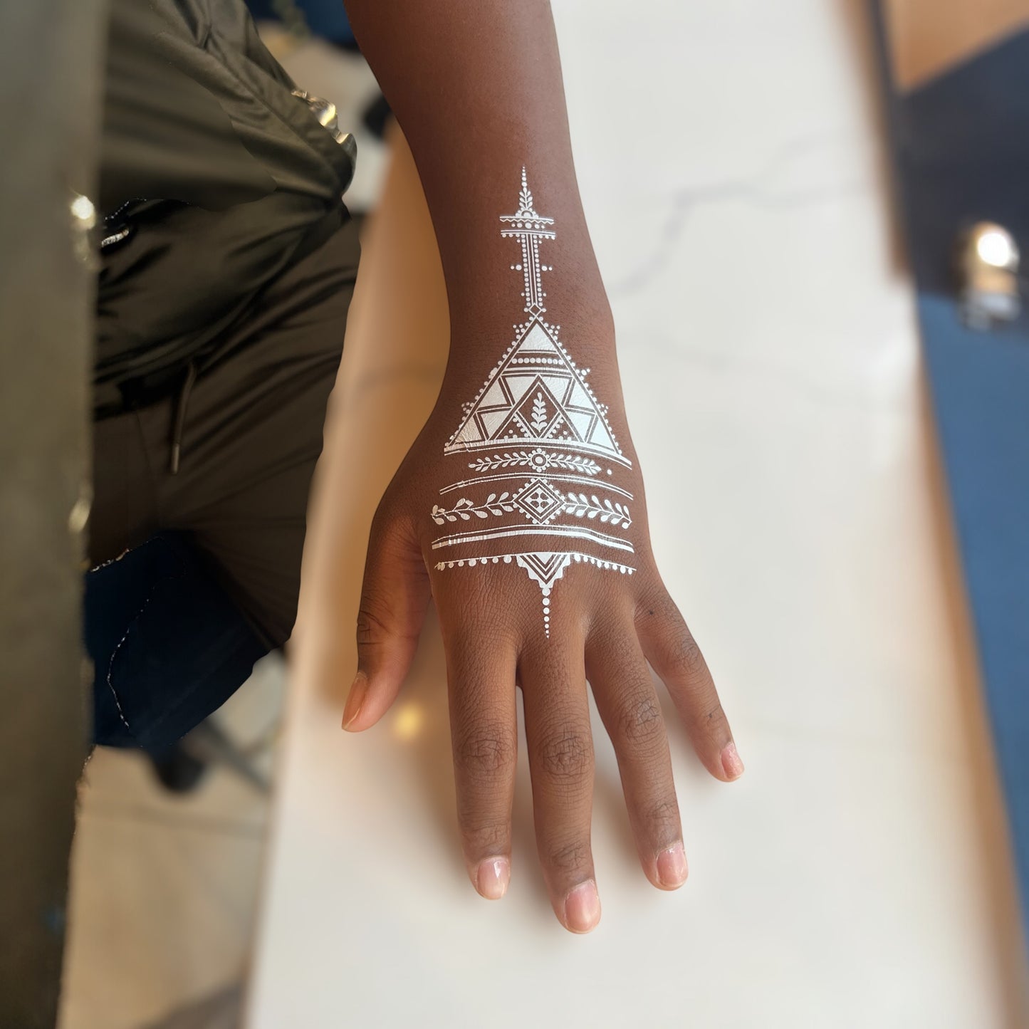 Ivory henna body art applied on skin — water-resistant, lasts 3–5 days | Palace.design