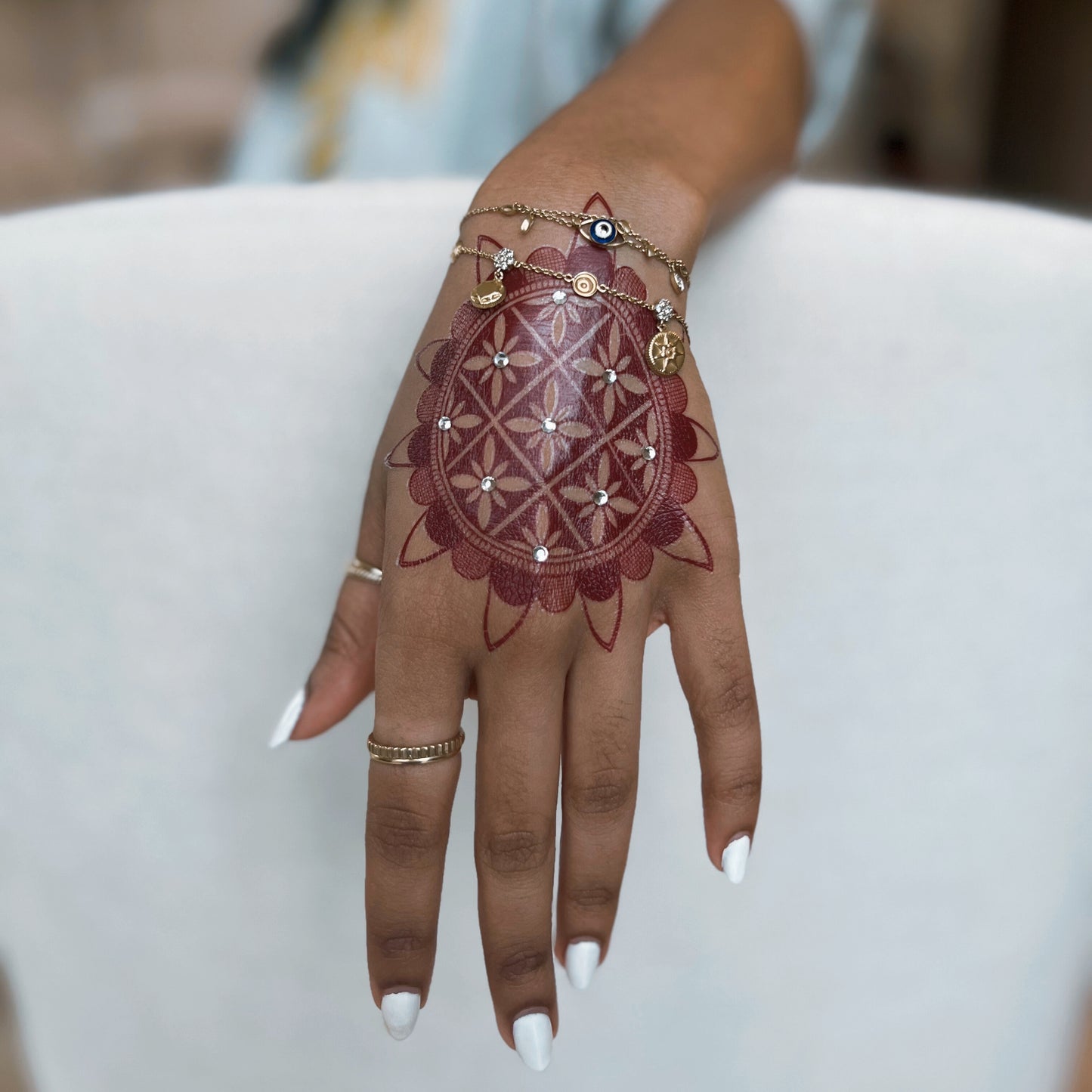 Champagne henna body art applied on skin — water-resistant, lasts 3–5 days | Palace.design
