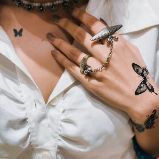 Eclipse henna body art on skin — peel, press & reveal, lasts 3–5 days | Palace.design
